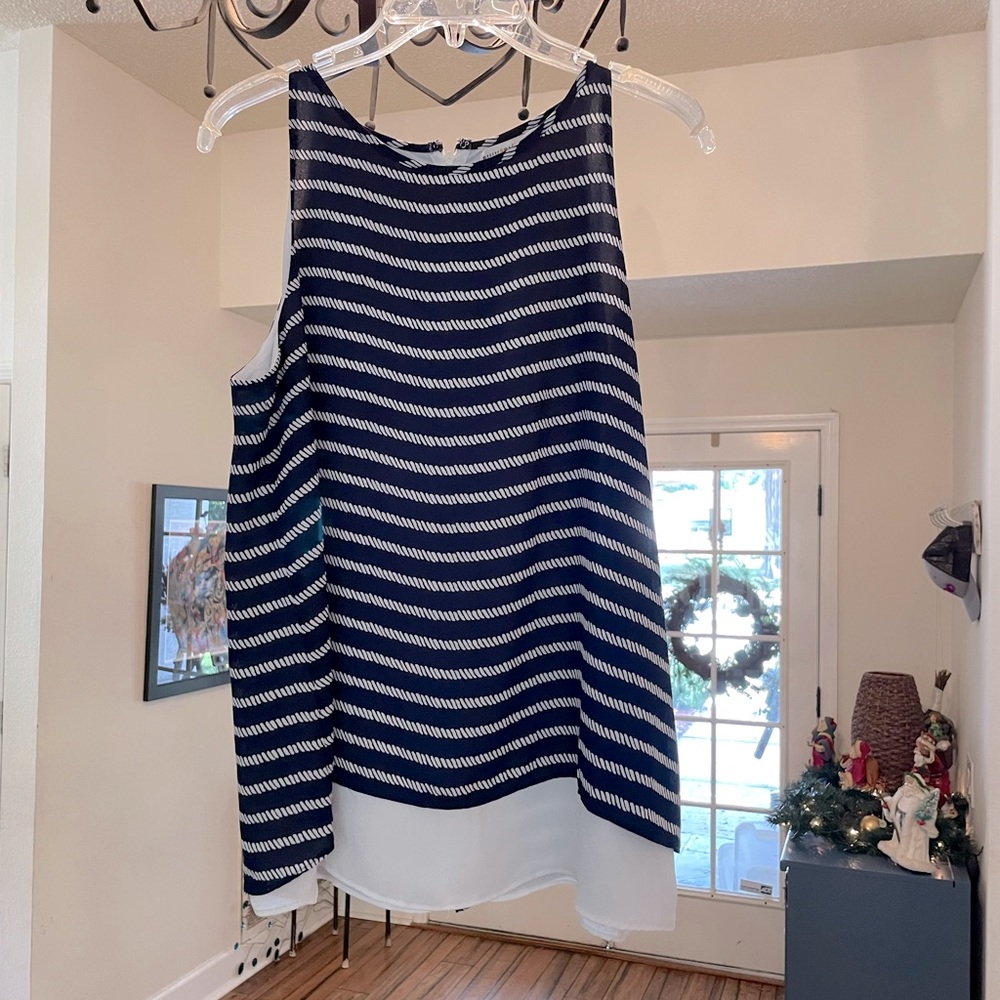 Navy and white nautical sleeveless top with white underlay size M